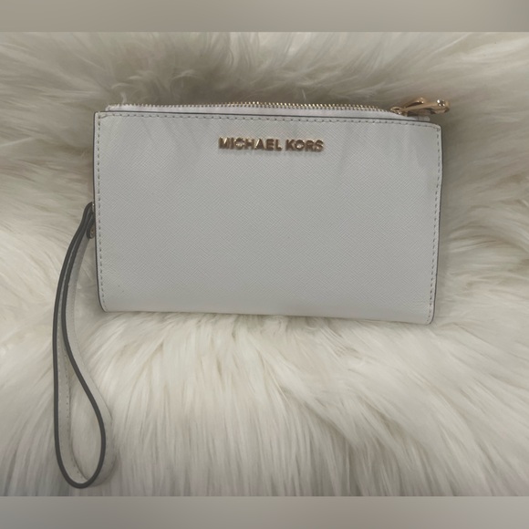 Michael Kors Handbags - Michael Kors White Wristlet with Gold Details